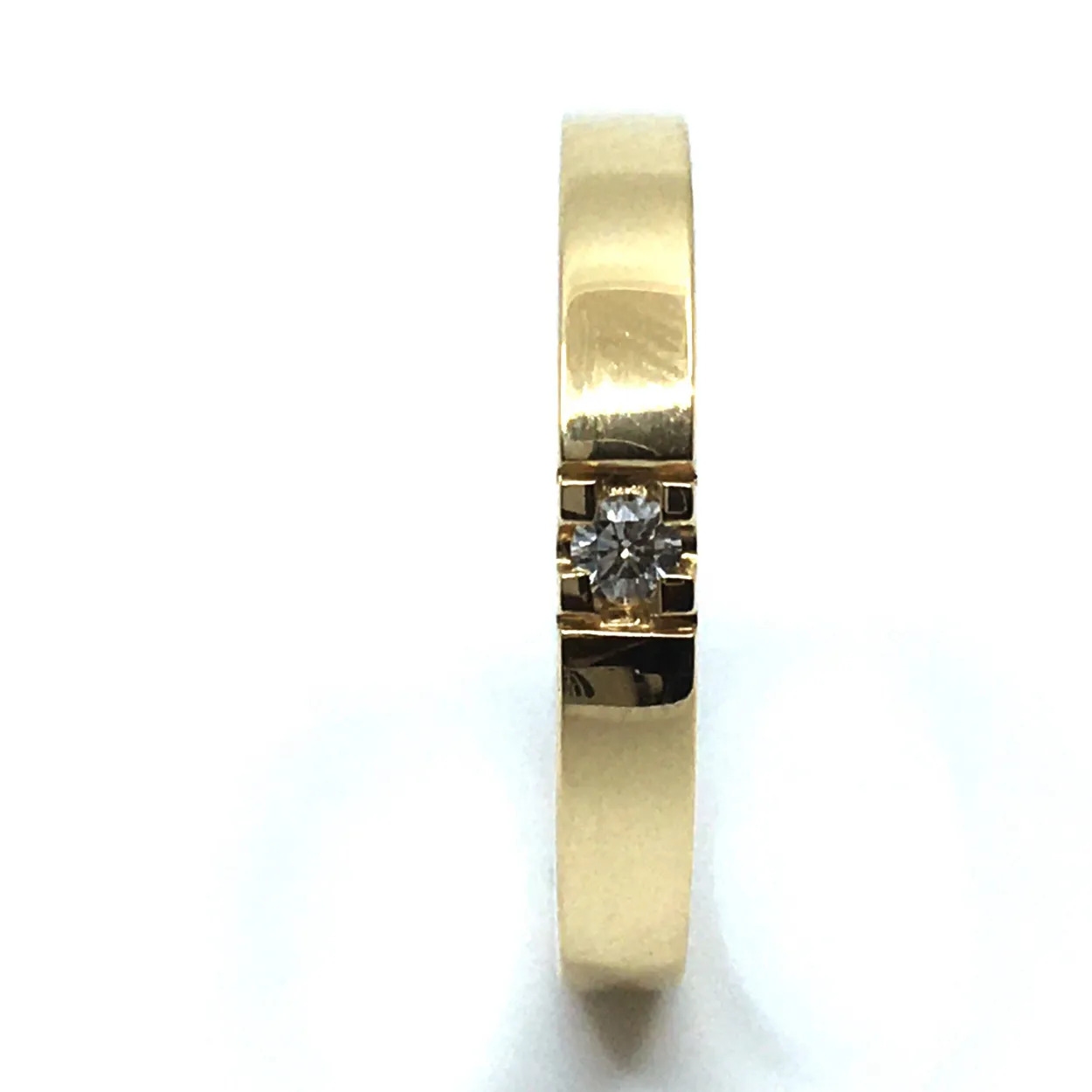14 KT. ALLIANCE RING GULD MED BRILLANT 1X0,05 CT. W/SI